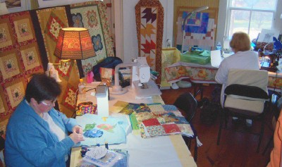 Callie and Sherry hard at work during a quilting retreat